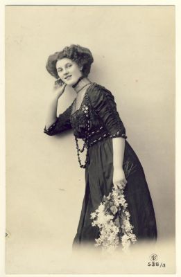 Woman with high-necked dress and flowers