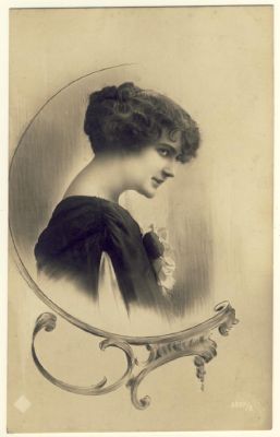 Woman side-face with curly hair