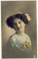 Woman with curly hair and hair ribbon