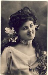 Woman with flowers and curly hair