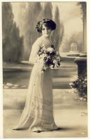 Woman with dress and flowers standing